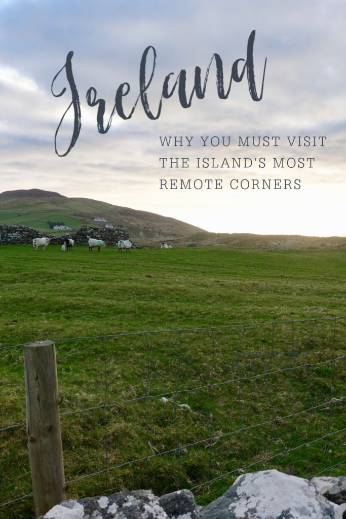 Irish countryside at sunset. Text reads "Ireland: Why You Must Visit the Island's Most Remote Corners."