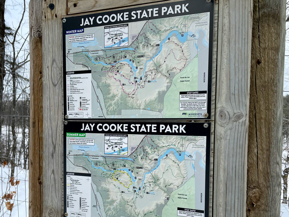 Sign display trail maps in Jay Cooke State Park
