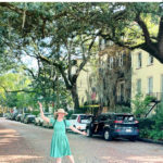 Woman poses in the middle of Jones Street Savannah Georgia. Text reads "Ultimate One Day Itinerary for Savannah, Georgia."
