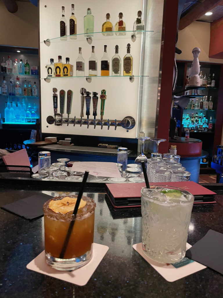 Two margaritas sit on a modern bar in Santa Fe
