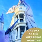 Hand points a wand at a dragon on the top of Gringotts Bank at Universal Orlando. Text reads "One Day at the Wizarding World of Harry Potter Orlando"