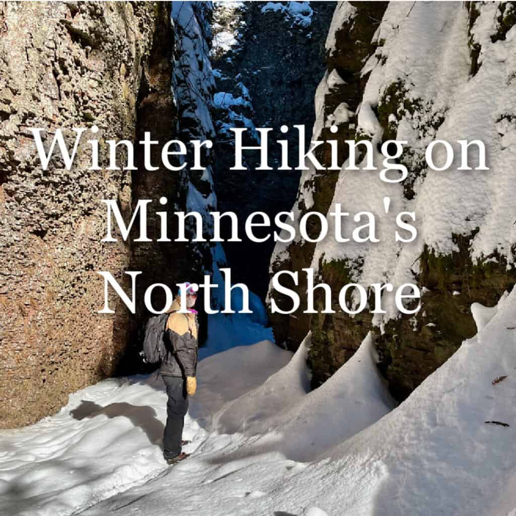 Woman stands in snowy river canyon on Minnesota's North Shore. Text overlay reads "Winter hiking on Minnesota's North Shore"