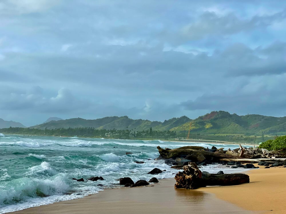Looking at the Pacific Ocean and Kauai mountains from an east side sandy beach