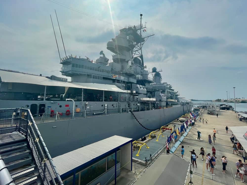 Large US battleship docked in Pearl Harbor Hawaii