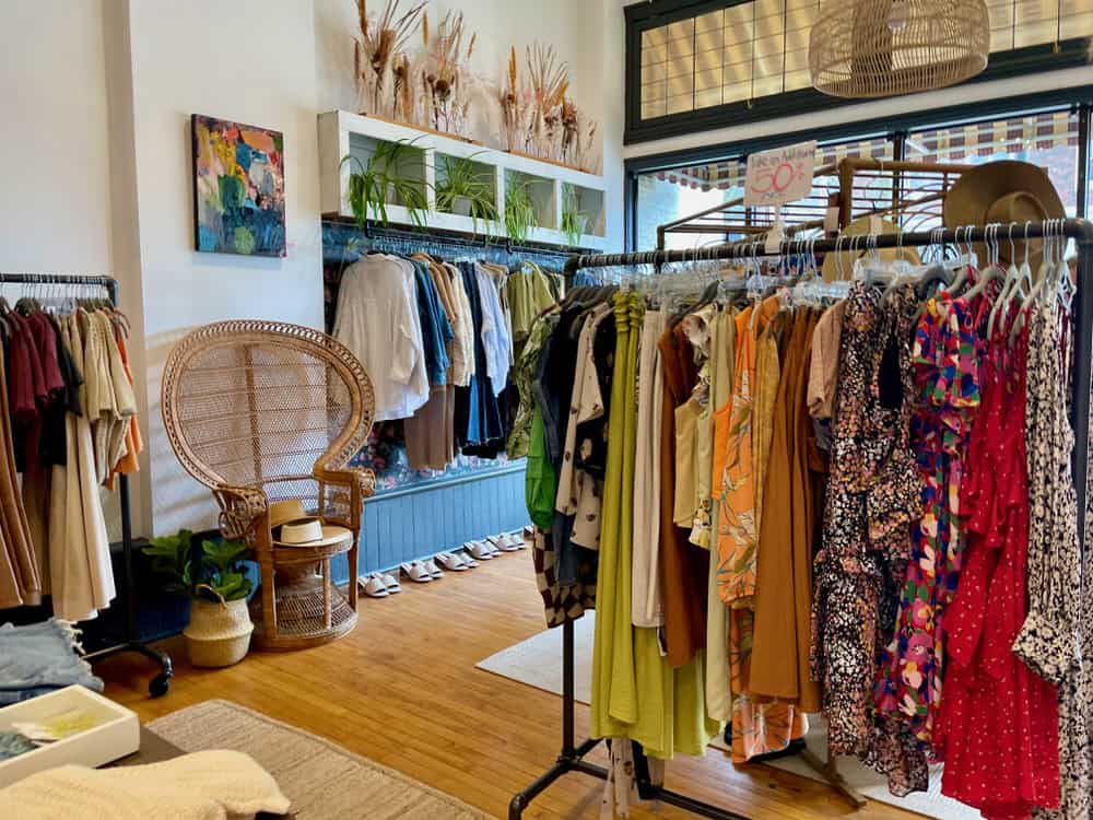 Colorful clothing racks inside an Eastown Grand Rapids Michigan boutique shop