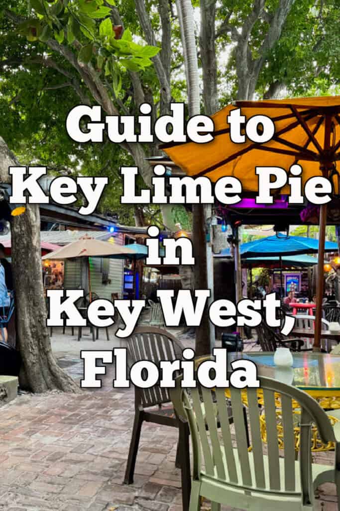 Outdoor patio in Key West Florida with colorful umbrellas and outdoor tables. Text reads "Guide to Key Lime Pie in Key West, Florida"