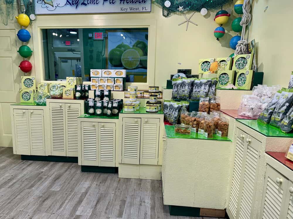 Pale green colored counters covered with a variety of key lime flavored products including candy, cookies, and key lime juice in Kermit's in Key West Florida