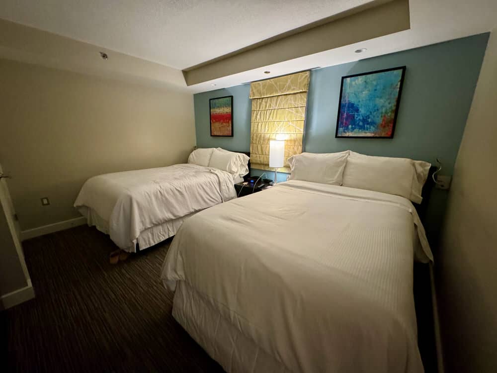 Two beds in a dark room at the Westin St. John Resort Villas