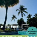 Palm trees around a resort pool. Text reads "A Firsthand Review Westin St. John Resort Villas."
