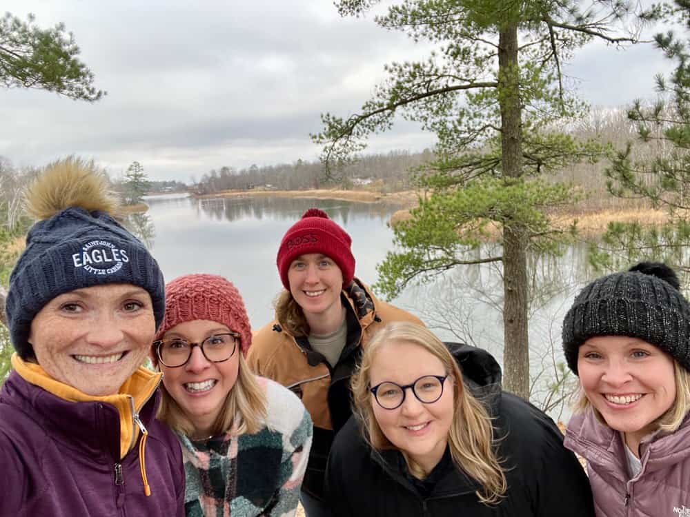 Selfie of five women in late autumn in front of a Mississippi River overlook in northern Minnesota.