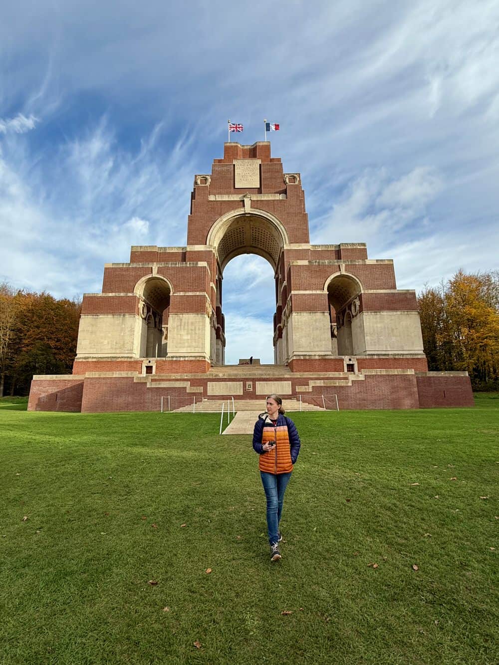 Woman walks in front of Thiepval Memorial in France
