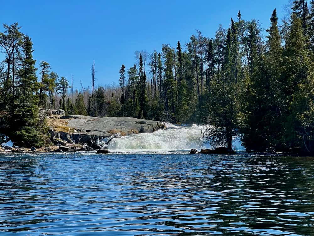 A small gushing waterfall on the Granite River in spring right after ice out.