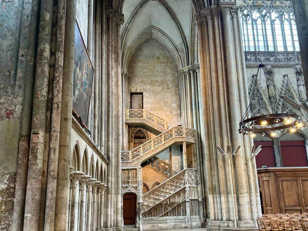 A stone stairway inside a French gothic cathedral