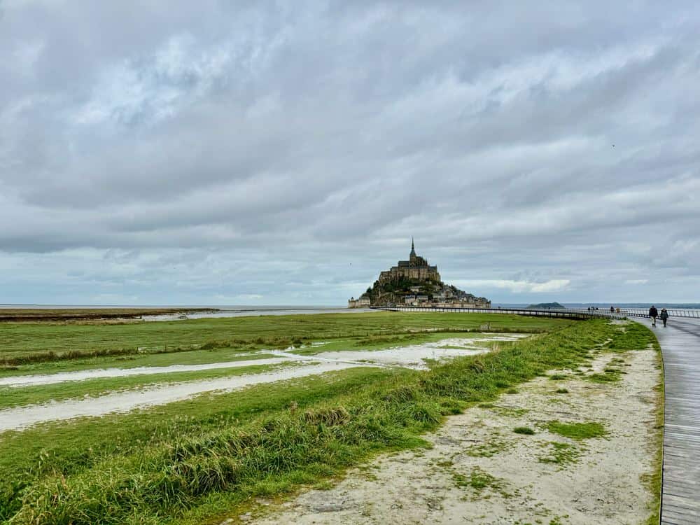 Cathedral on a tidal island on the horizon.