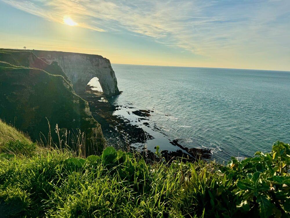 A white limestone arch cliff on the English Channel in northern France near Etretat