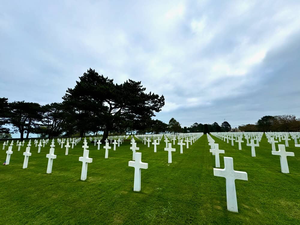 Grass lawn filled with crosses in Normandy, France