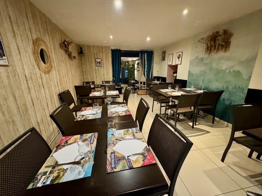 Interior of a Bayeux creperie set up for dinner service