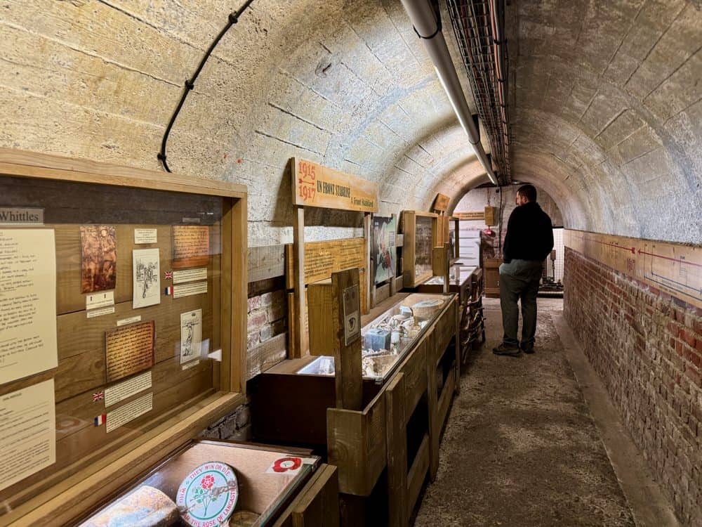Man reads exhibits in an underground museum devoted to the history of the 1916 Battle of the Somme