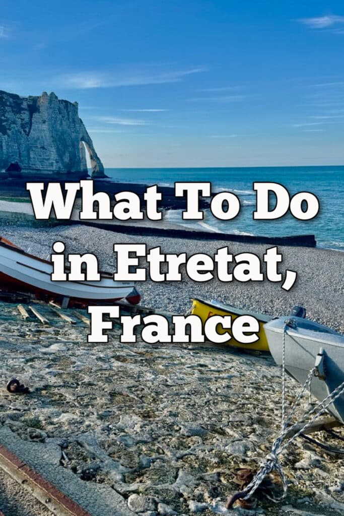 Boats on the beach in front of Etretat cliffs. Text overlay reads "What to do in Etretat, France."