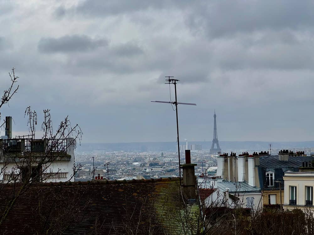 View across Parisian rooftops towards the Eiffel Tower