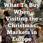Close up of a small ceramic fairy houses at a Christmas market booth. Text overlay reads "What to buy when visiting the Christmas markets in Europe."