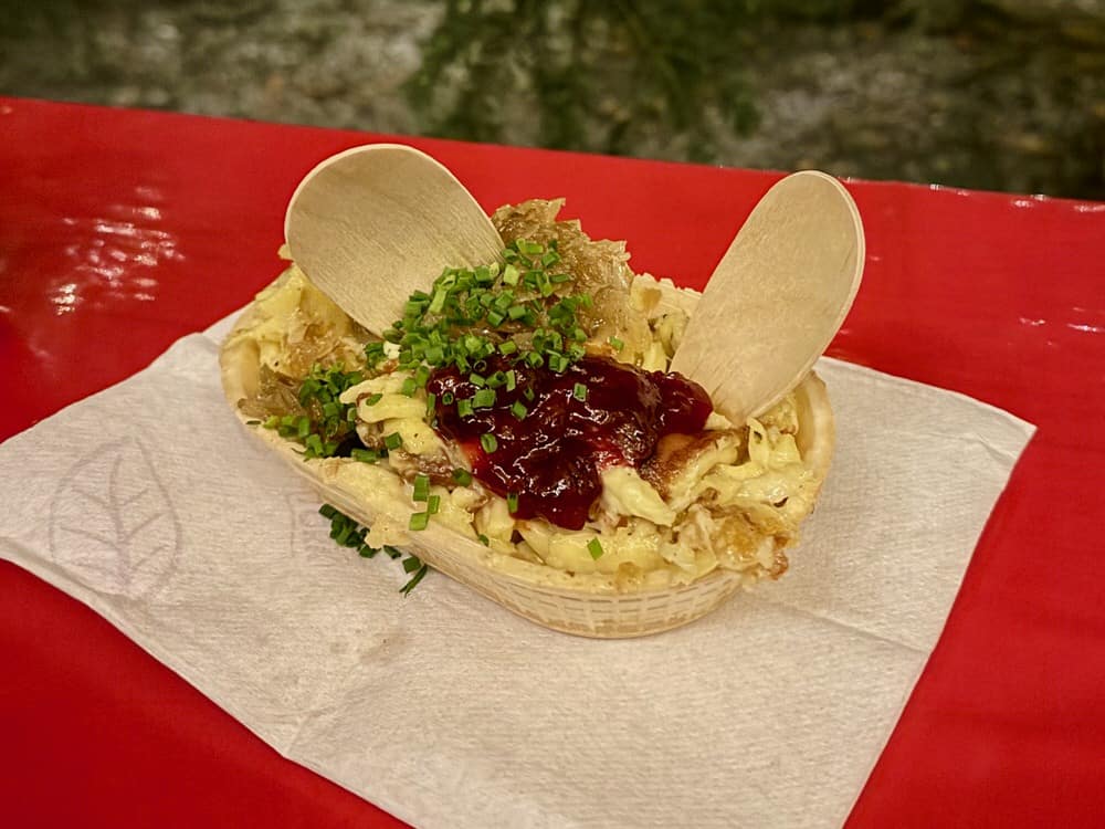 A serving of kasespaetzle at a German Christmas market