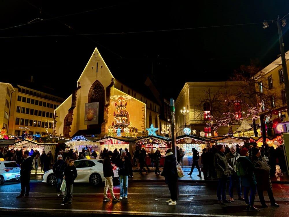 Looking at Barfüsserplatz Christmas market in Basel after dark