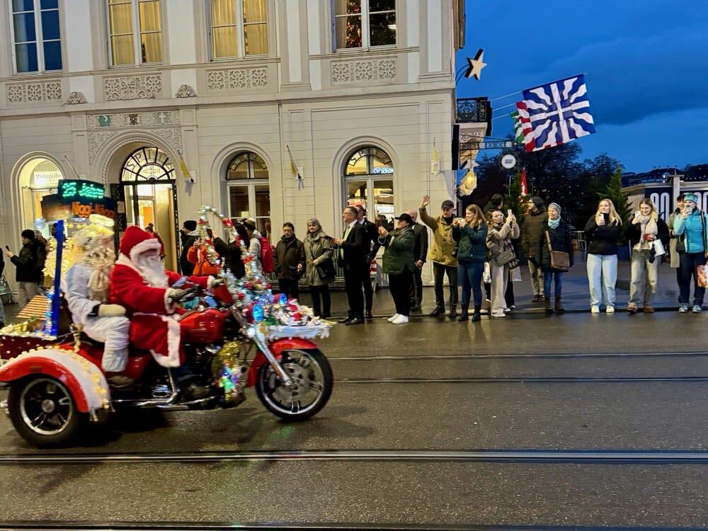 People watch the annual Santa Niggi Naggi parade in Basel Switzerland