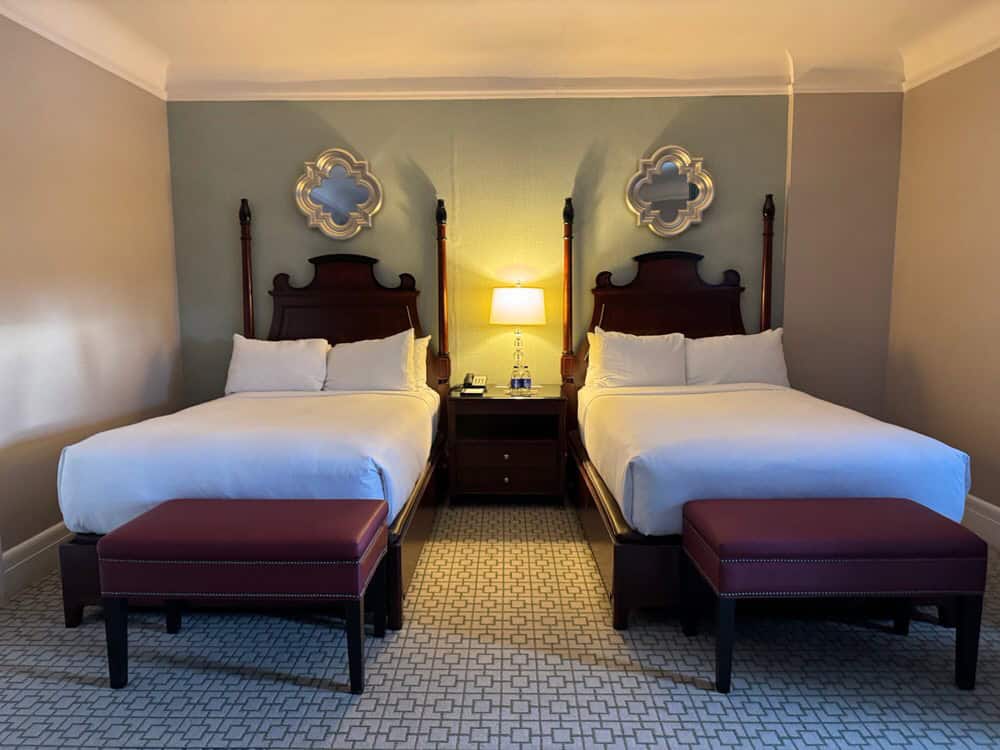 Two queen beds in a historic hotel room