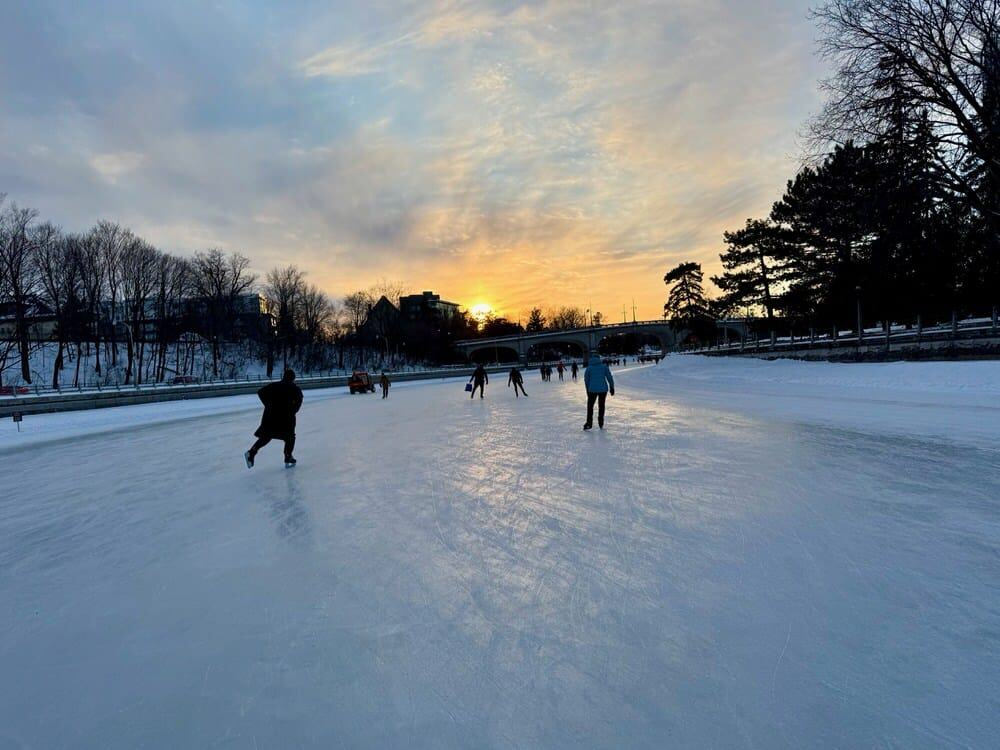 Skaters on the frozen Rideau Canal in downtown Ottawa