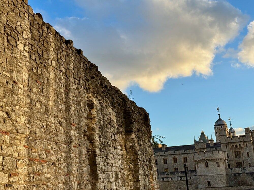 A stone wall dating back to Roman times stands next to the Tower of London