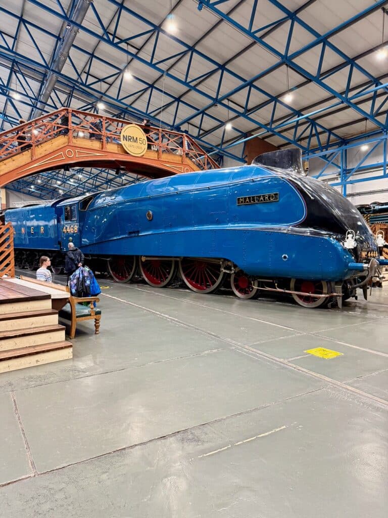A blue steam engine at the National Railway Museum in York.
