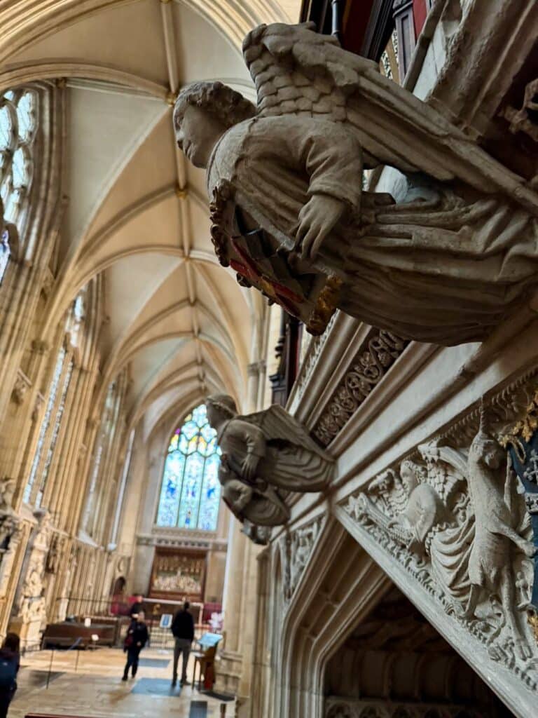 Stone angel carvings in the walls inside York Minster Gothic Cathedral