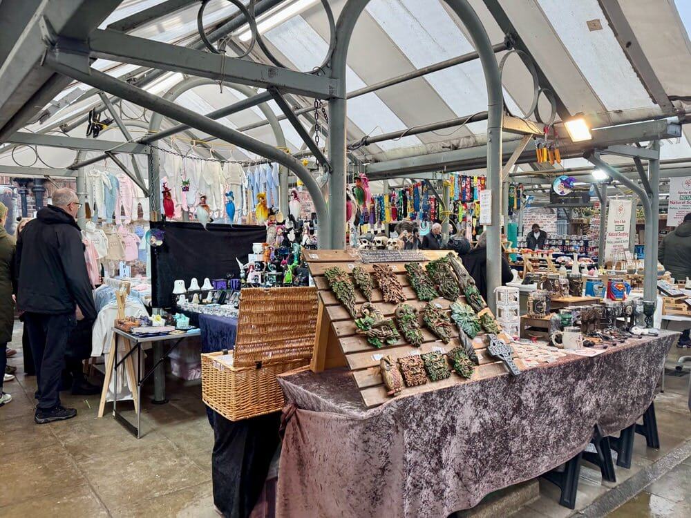 Covered market in York City Centre selling knick knacks and clothing