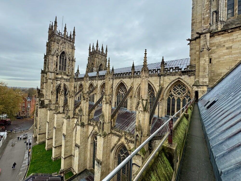 View of the exterior of York Minster and its towers and roof as seen from the transept roof.