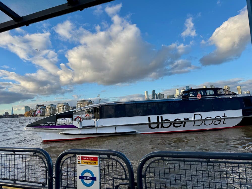 An Uber Boat comes in to dock at the Greenwich Pier to pick up passengers