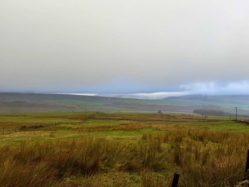 Clouds collect over the rolling hills in the Yorkshire Dales