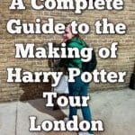 Woman poses in front of a trolley disappearing into a brick wall at the Platform 9 3/4 exhibit at the Making of Harry Potter Tour London. Text overlay reads "A Complete Guide to the Making of Harry Potter Tour London."
