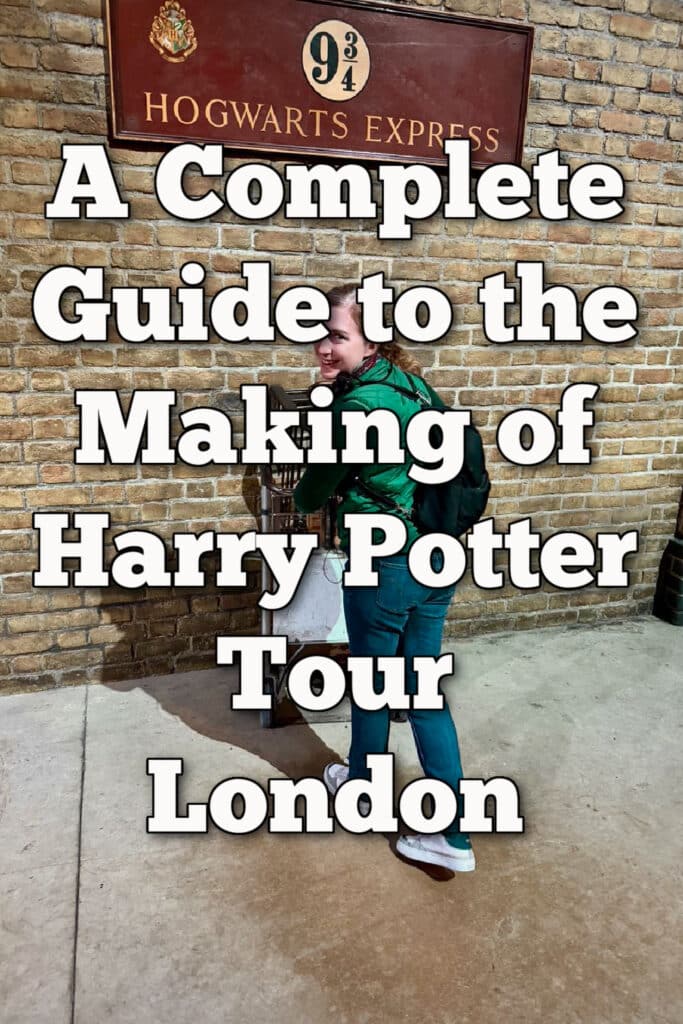 Woman poses in front of a trolley disappearing into a brick wall at the Platform 9 3/4 exhibit at the Making of Harry Potter Tour London. Text overlay reads "A Complete Guide to the Making of Harry Potter Tour London."