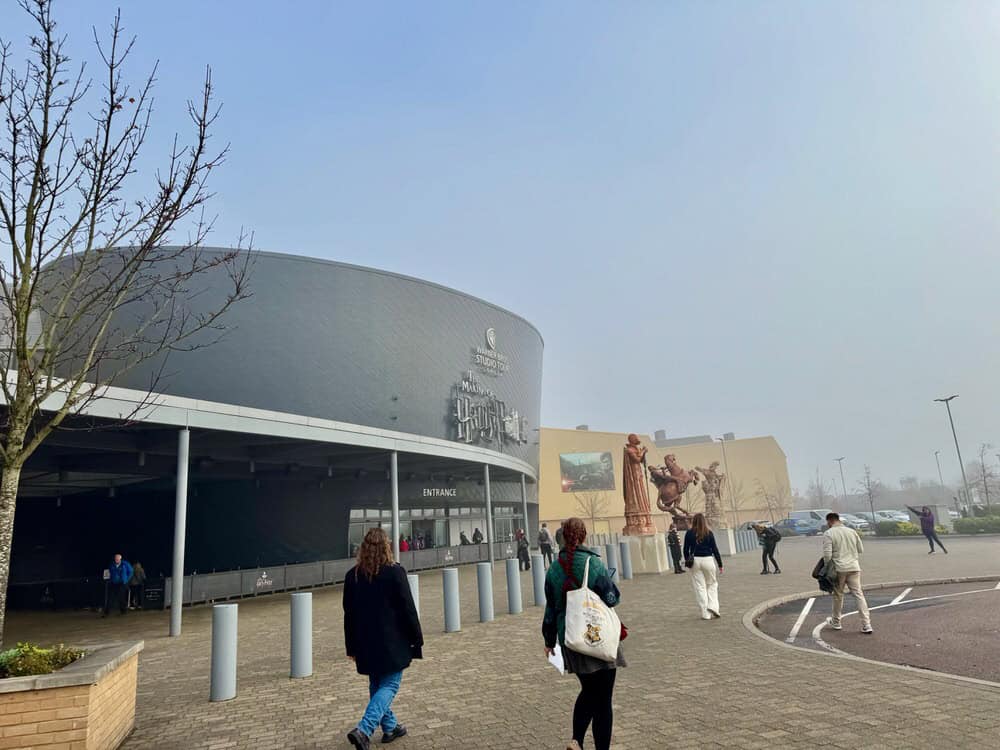 Visitors walk towards the main entrance to the Harry Potter Studio Tour London