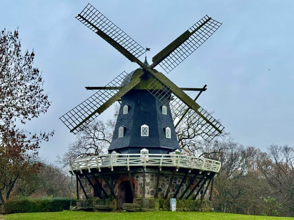 A Dutch style windmill in the center of a city park in Malmo Sweden