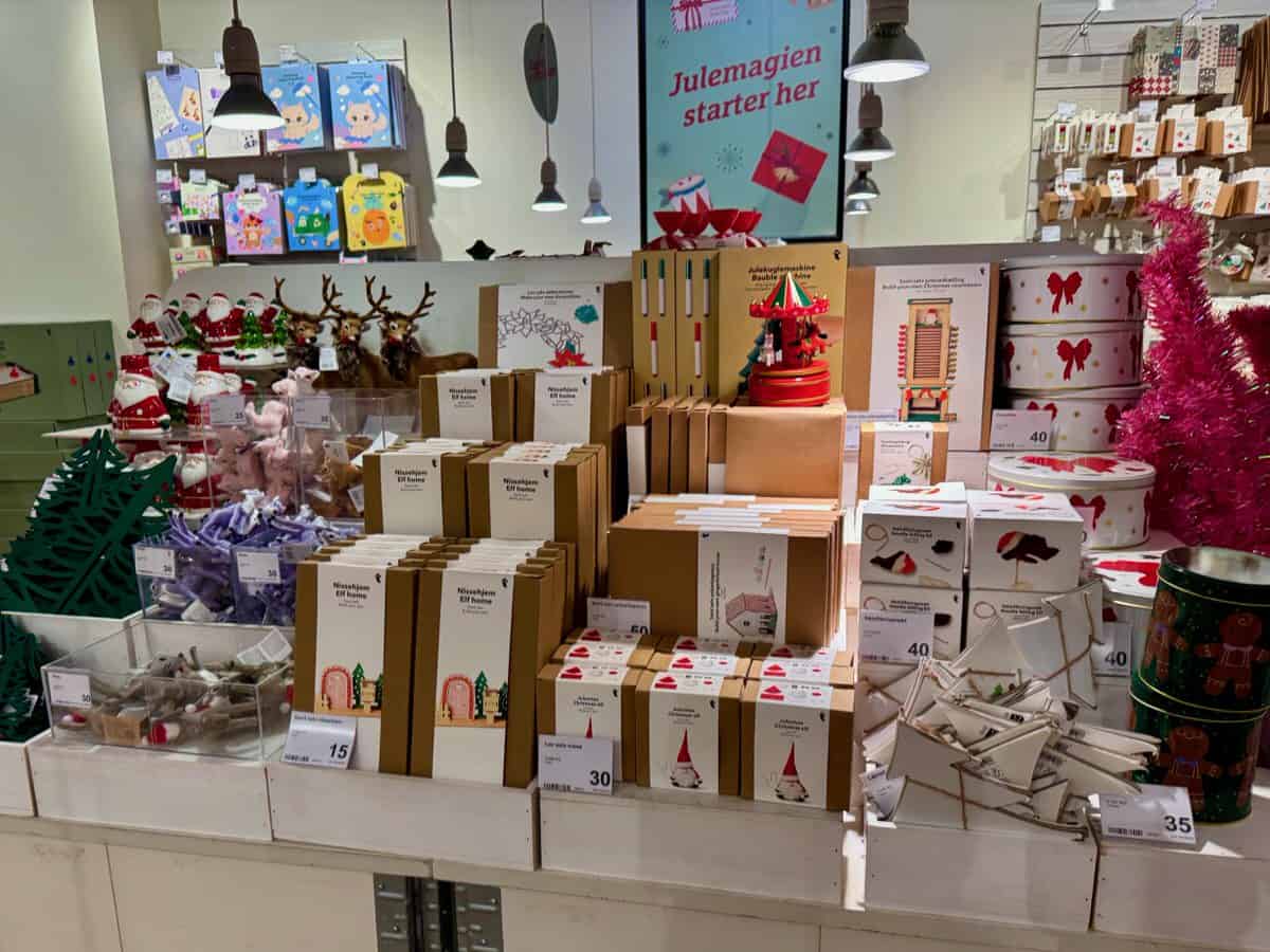 A stocked shelf of low cost Christmas items in a Flying Tiger Copenhagen store