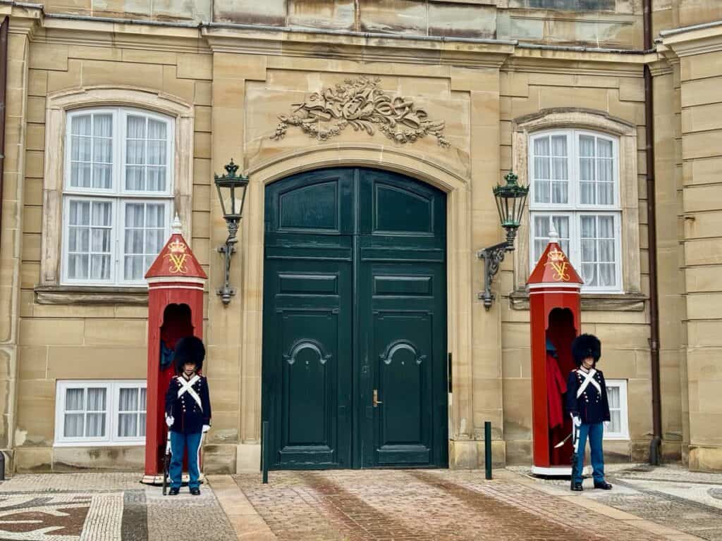 Two palace guards in front of Amalienborg Palace in Copenhagen