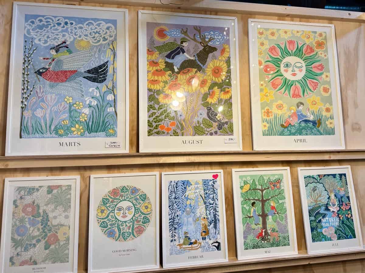 Framed art prints by Danish artist Lisa Grue depicting seasonal scenes