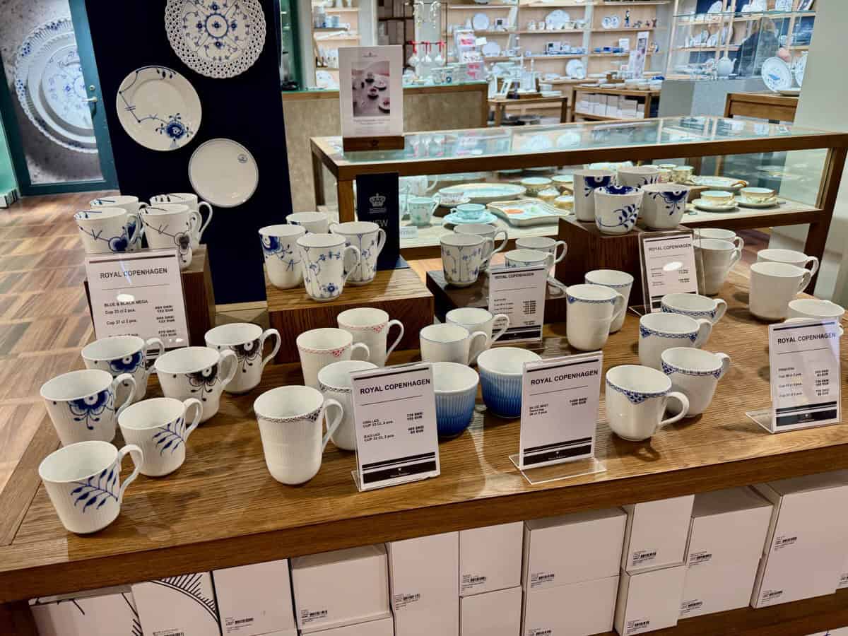 White china by Royal Copenhagen on a gift shop table