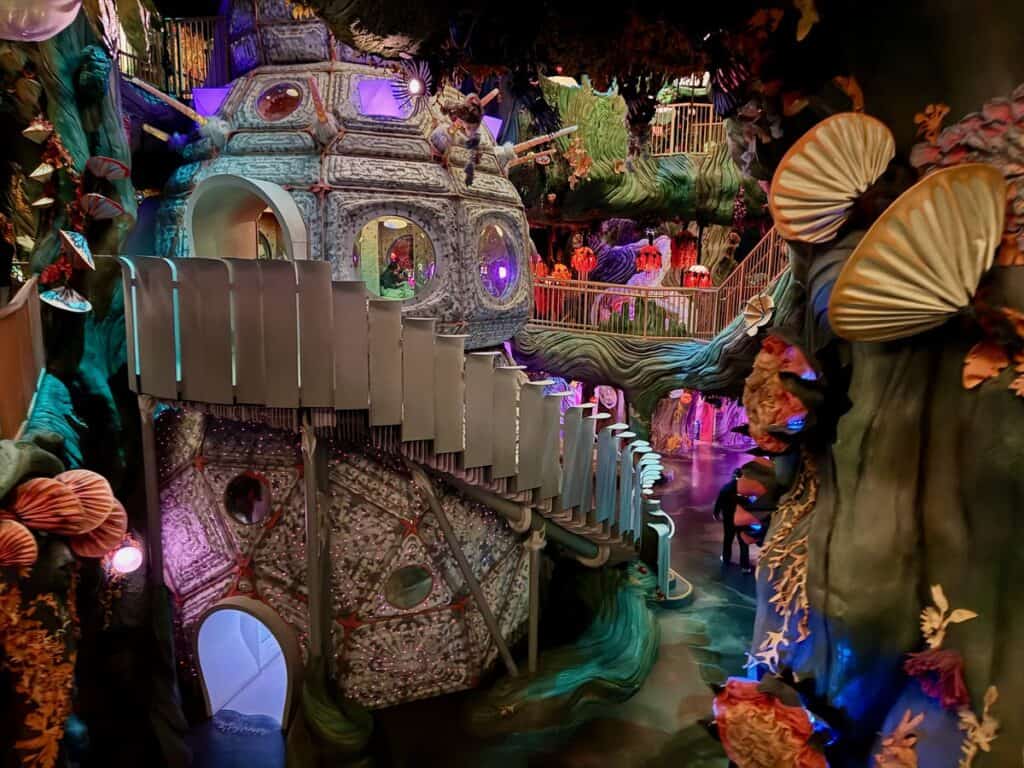 A colorful otherworldly set inside Meow Wolf Denver meant to represent another planet