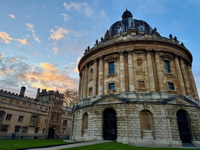 Radcliffe Camera building in Oxford England at sunset