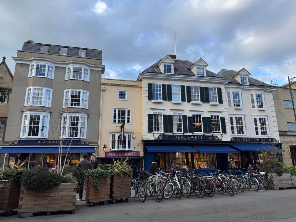 Exterior of Blackwell bookstore and White Hart pub in central Oxford